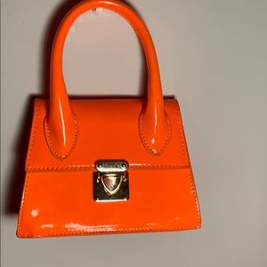 A cute orange purse